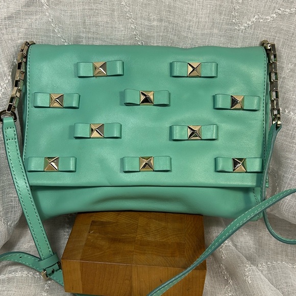 kate spade Handbags - Kate Spade leather with bows and studs embellishments shoulder crossbody bag